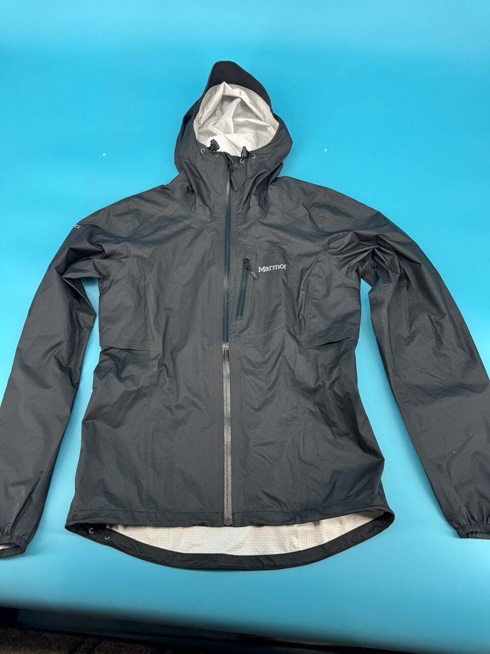 Marmot Women's Essence Ultralight Waterproof Hooded Rain Jacket Black XS
